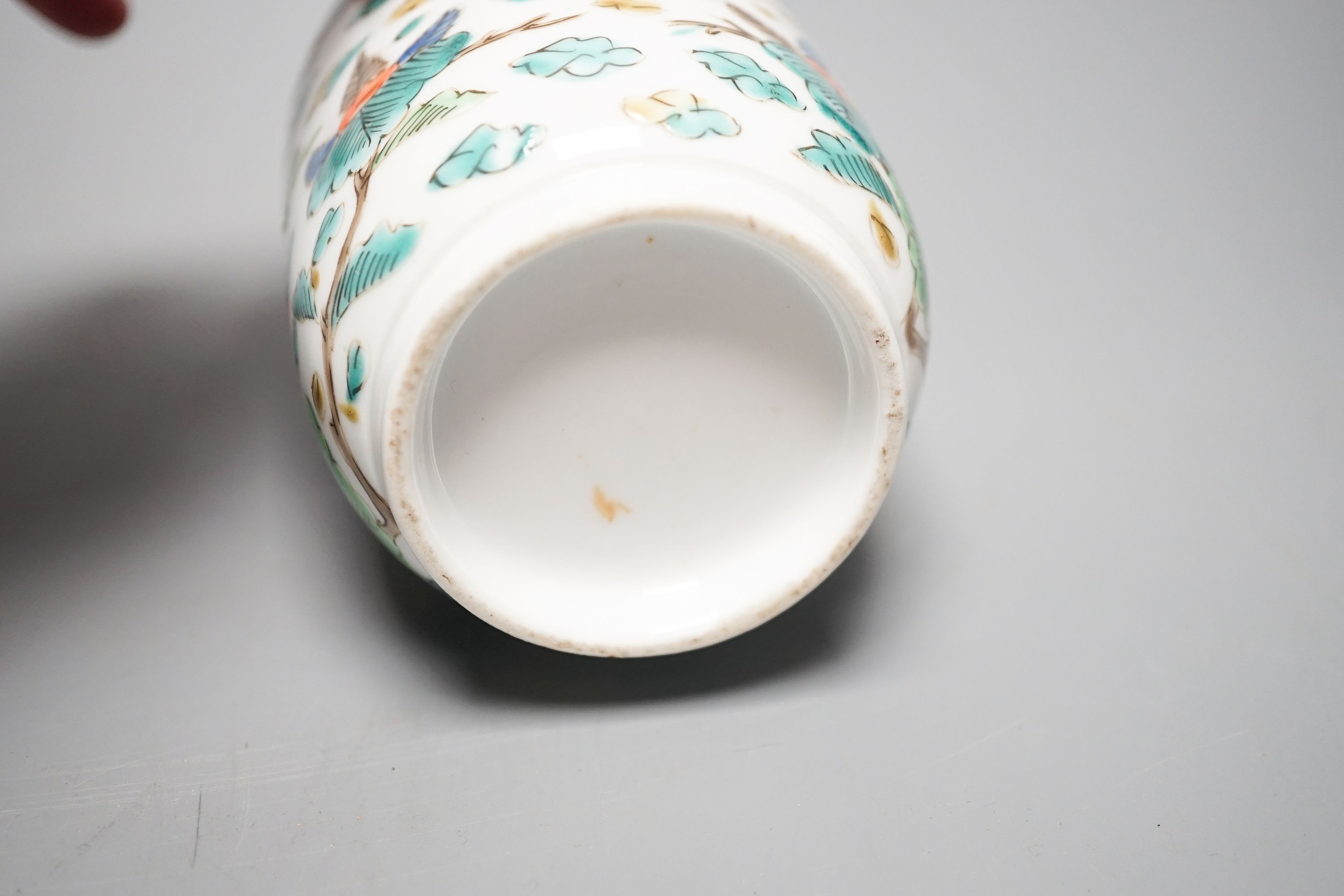 Two Chinese porcelain saucer dishes and an enamelled porcelain vase, 18th century and later, 12.5cm